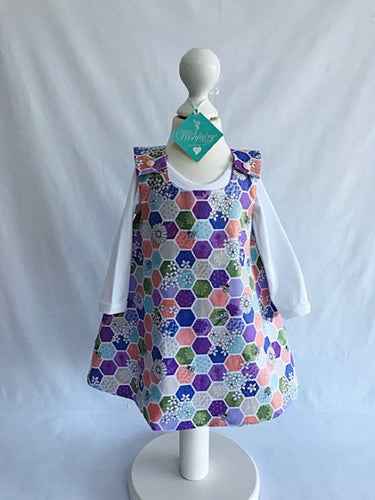 The Wishfairy Reversible Pixie Pinafore Baby Dress (Bee Hexagons on Green)