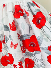 The Wishfairy Bunty Baby Dress (Large Red Poppies Border On White)