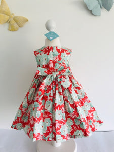 The Wishfairy Bunty Baby Dress (Mint Green Floral on Dark Coral)